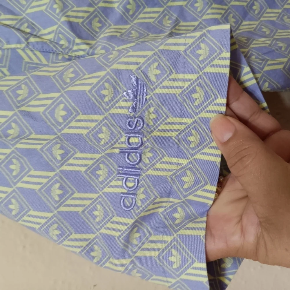 Adidas Men's Blue and Yellow Patterned Shirt